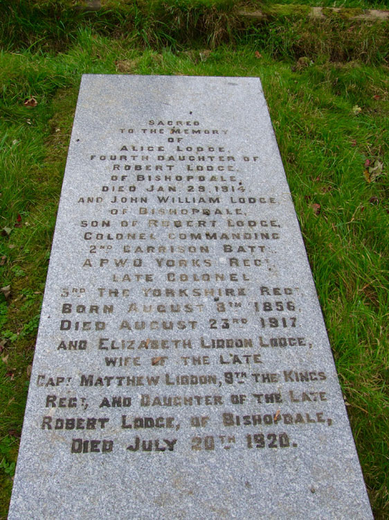 detailed photo of the left-hand headstone, - includes Colonel Lodge's commemoration, is below.
