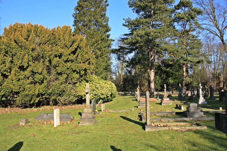 The headstone for Private Porter (left) in Boston Cemetery