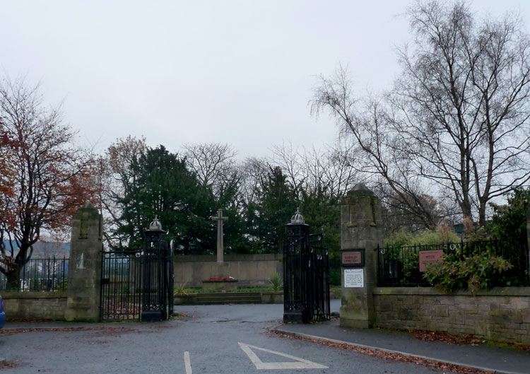 The Cross of Sacrifice and the First World War Screen Wall at the Entrance to Burnley Cemetery.