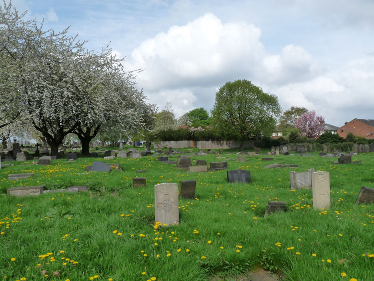 Leeds (Holbeck) Cemetery, with the headstone for Private Hardgrave in the centre foreground 