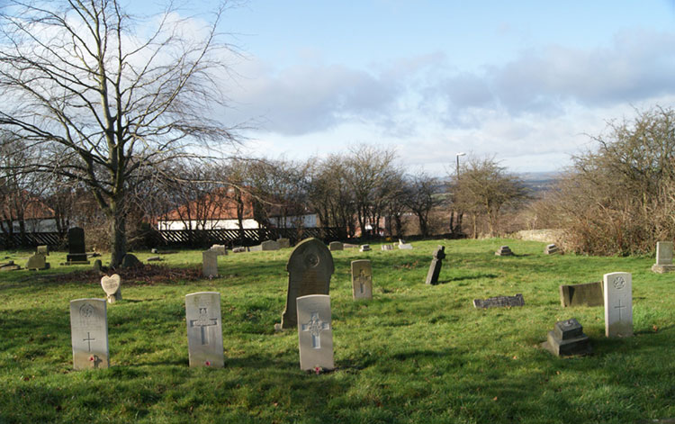 Penshaw (All Saints') Churchyard, with the graves of Privates Oliver and Walker in the centre.
