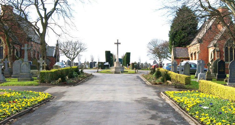 The entrance to Seaham Cemetery, showing the Cross of Sacrifice.