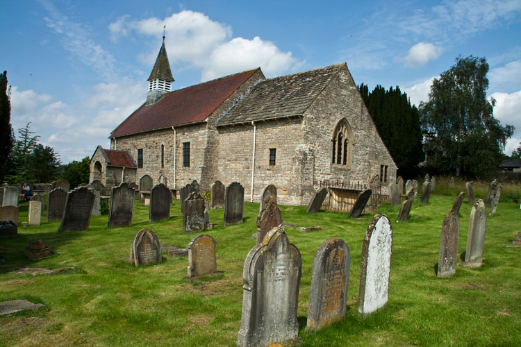 All Saints' Church, Sinnington. Private Hartas' grave just visible on the left.
