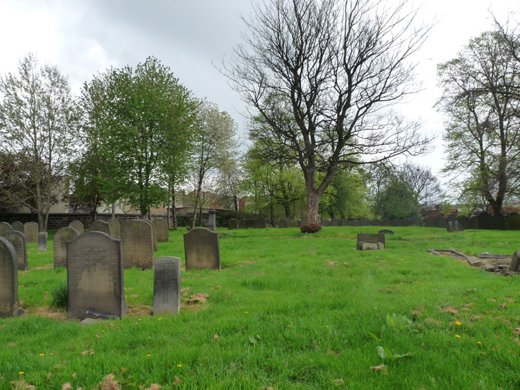 Leeds (Beckett Street) Cemetery, with the headstone for Private Thompson in the centre foreground