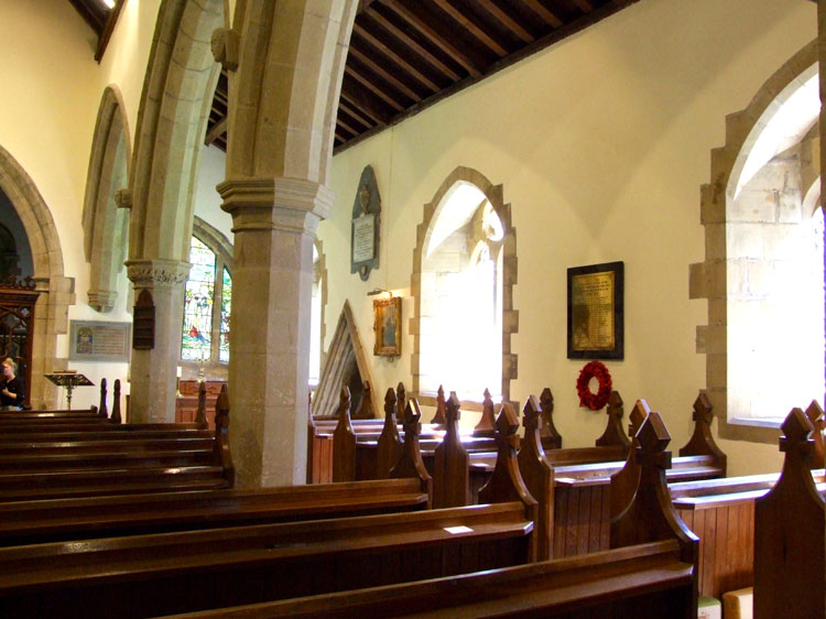 The Interior of the Church of St. Michael and All Angels, Middleton Tyas, showing the WW1 Memorial Plaque