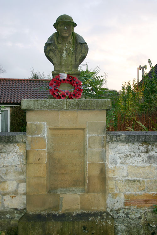 The War Memorial in Kilburn, outside the Parish Church. (Photo : Edward Nicholl)