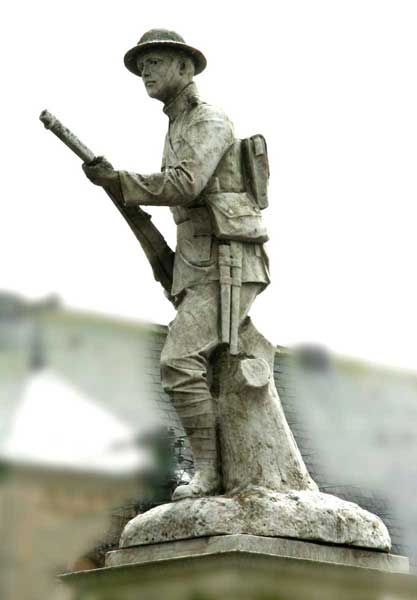 The sculpture of a First World War infantryman on top of the Tow Law War Memorial (April 2009)