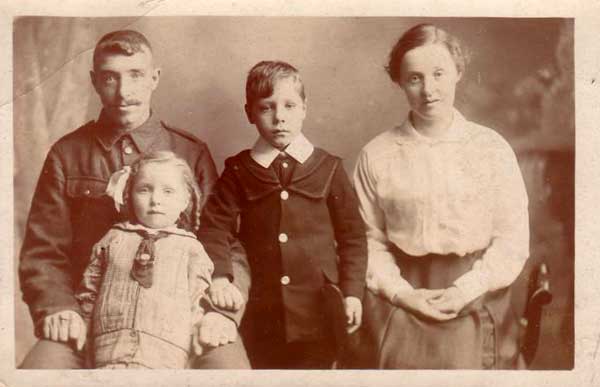 James Stansfield with his wife, Emma, and two children.