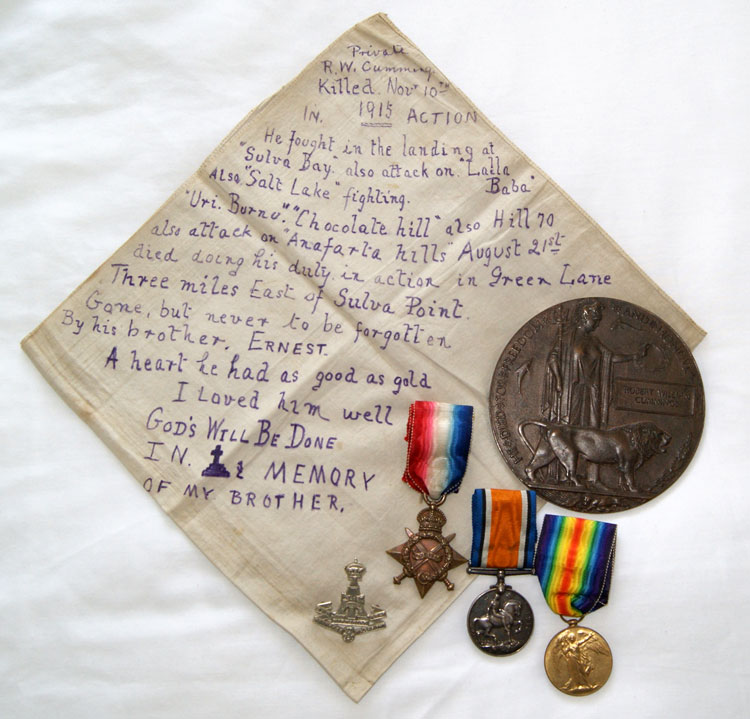 The Handkerchief with a Message Written by Ernest Cummings, together with Robert William Cummings' Medals and Memorial Plaque