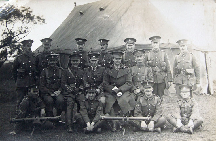 William Stockdale, - 3rd from right in the back row, with a group of soldiers from the Yorkshire Regiment, West Yorkshire Regiment, and Grenadiers. The two instruments in the foreground are range finders. Clearly, this group of men will have been on a course in using range finders.
