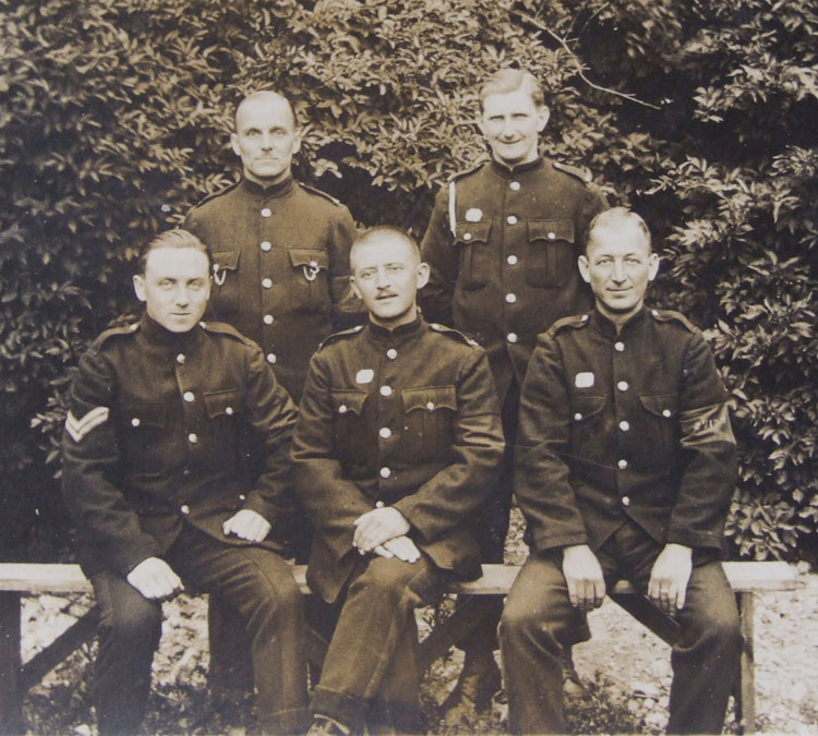 William Stockdale, back row (right), with a fellow group of Prisoners of War. These are identified from the card below as Private F Mitchell, Private W H Stockdale, Corporal J H Vasey, Private E Frain, and Private J Perkins.