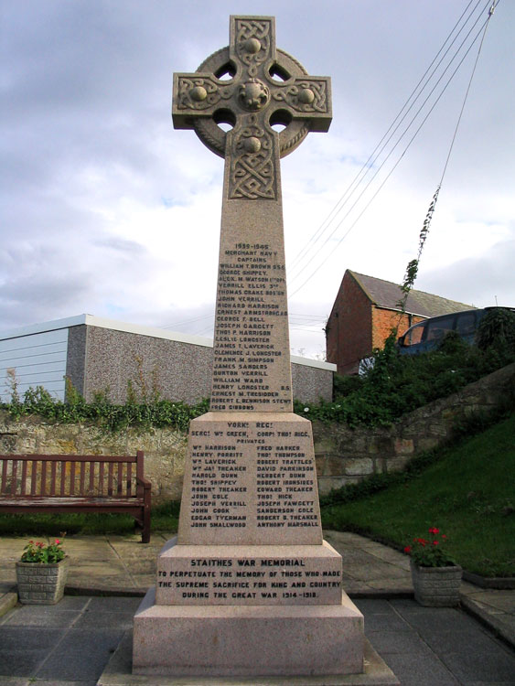 The Staithes War Memorial, at the top of the bank leading down to the harbour