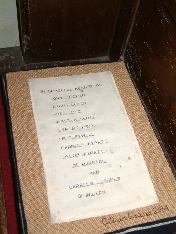 A Kneeler with First World War Commemorations in St. Mary's Church, Burstall. (2 additional names)