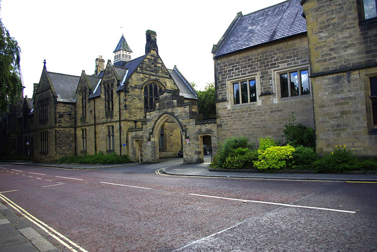 The front of Durham School taken from the road outside, illustrating the Kerr Arch in the centre.