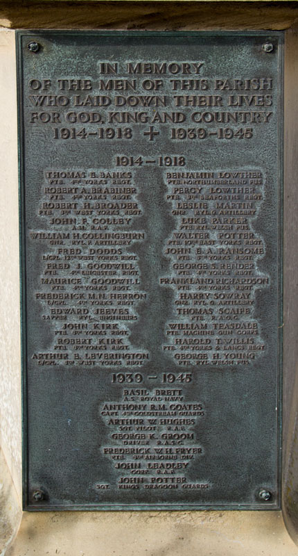The memorial plate on the Helperby War Memorial