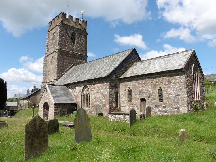 St. Mary's Church, Molland (Devon) - the War Memorial Cross can be seen just outside the main entrance porch