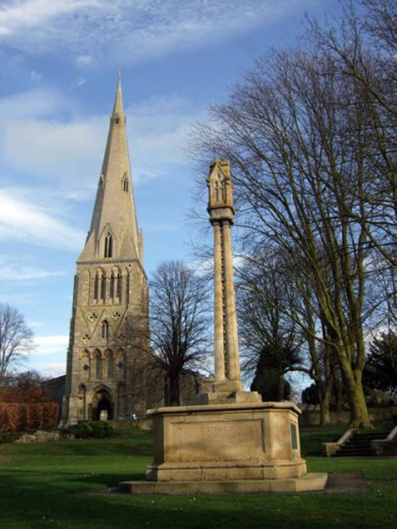 The Raunds War Memorial and St. Peter's Church