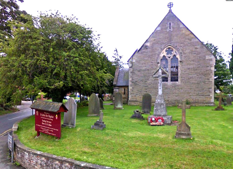 The Stamford Bridge War Memorial and the Church of St. John the Baptist (August 2011)